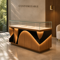 Vitrine d'exposition de bijoux LED haut de gamme en gros, vitrine en bois, métal et verre sur mesure pour salle d'exposition et bijouterie