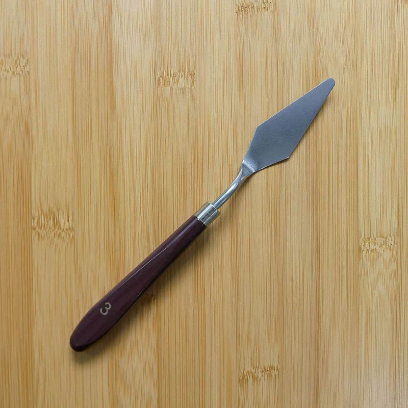 No. 3 dark red  diamond-shaped plastic handle scraper