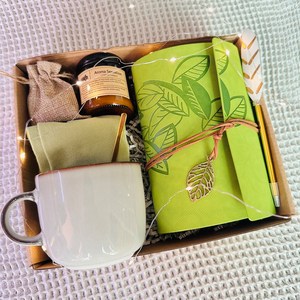MOQ bajo Kits de spa personalizados Juego de regalos para mujeres Juego de regalo de negocios con bolígrafo y taza para cuaderno - Product Image 1