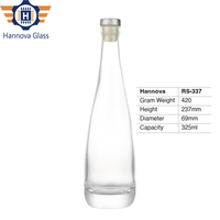 Bouteille d'eau minérale en verre de 325 ml, forme conique unique, base lourde, transparente, vide, pour boissons et jus, vente en gros