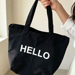 Sac fourre-tout promotionnel pliable en toile de coton noir avec impression de lettres - Product Image 4