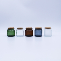 Vente en gros d'usine, haute qualité, vente directe, verre ambré transparent vert, 100 ml, 200 ml, pot à bougie avec couvercle en liège