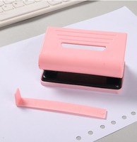 Perforatrice manuelle pour fournitures de bureau Mini Macaron Perforatrice pour papier à feuilles mobiles de bonne qualité