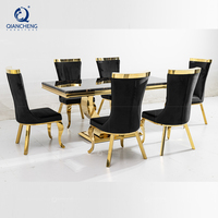 Ensemble de table à manger en marbre et acier inoxydable pour la salle à manger des maisons, avec 6 chaises