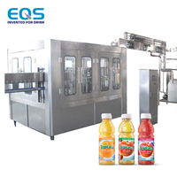 Machine de remplissage automatique multi-têtes pour la production de jus de fruits avec installation professionnelle à l'étranger