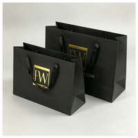 Hot Sell Custom Gold Foil Logo Black Matt Paper Bag With Ribbon Handles Shipping Packaging Bag