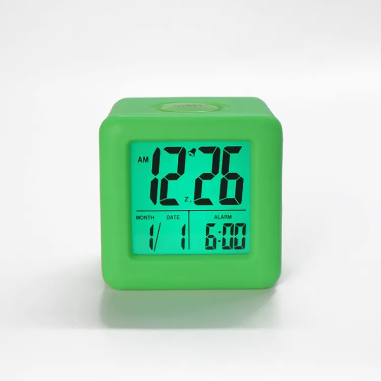 Hot selling multi color fancy cheap kids silicone alarm clock with light in the dark