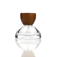 Flacon de parfum transparent en verre semi-circulaire bonhomme de neige 30ml 100ml avec pulvérisateur sérigraphié et grand bouchon en bois pour diffuseur à bâtonnets