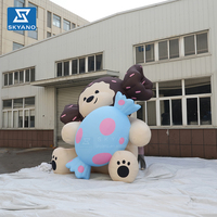 Modèle de chien gonflable personnalisé en forme de bonbon, style dessin animé, pour la publicité et la décoration d'événements en centres commerciaux et sur le marché en plein air