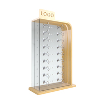 Support en bois de chêne de magasin d'optique avec logo personnalisé tenant 18 paires de lunettes de soleil vitrine de comptoir