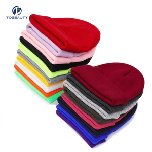 Bonnet tricoté unisexe en acrylique pour l'hiver, avec revers, motif à pois et nœud, idéal pour la plage, pour hommes et femmes - Product Image 1