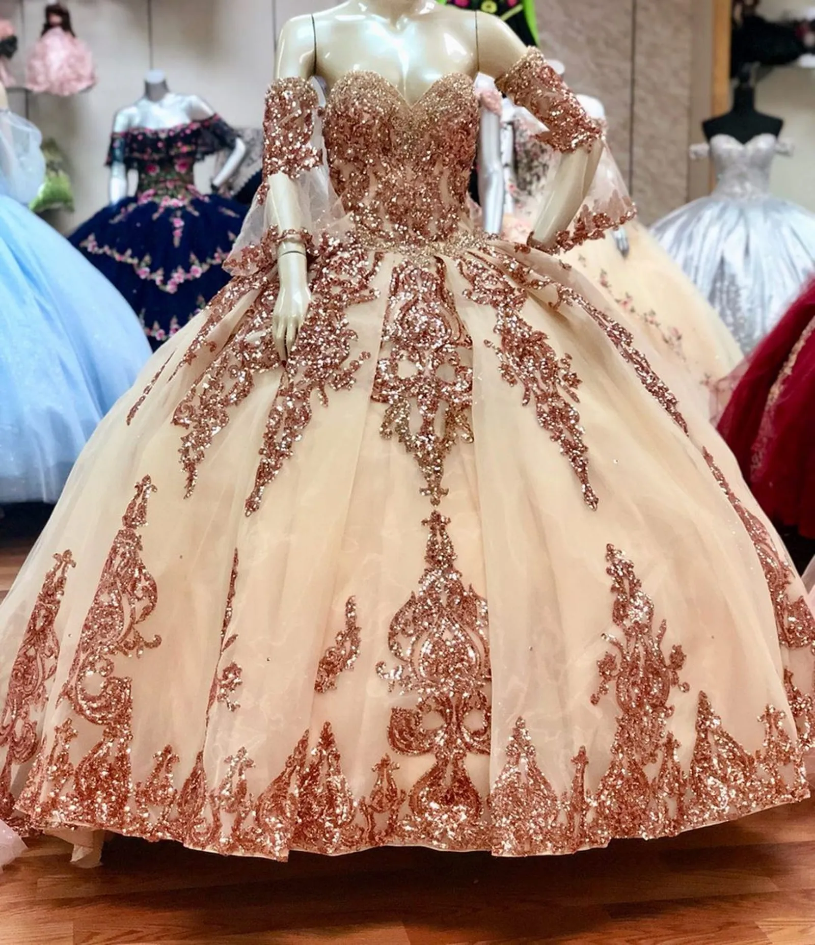 Shop Our Rose Gold Sparkly Ball Gown Quinceanera Dresses