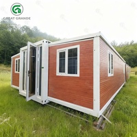 Maison préfabriquée portable de 30 pieds, 2 chambres, bureau modulaire, avec une isolation élevée et un design élégant pour la vie en plein air