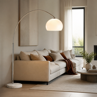 Lampadaire LED moderne à courbe arquée, base en marbre chromé, idéal pour le salon - Vente chaude