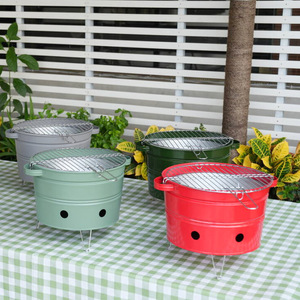 Portable Outdoor BBQ Grill Bucket Shape With Lid And Legs For Camping And Picnic Use - Product Image 1