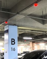 Système de stationnement intelligent à ultrasons intégré Wanbo à montage frontal avec RS485 TCP/IP et débogage via application pour la guidance au stationnement