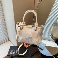 Sac seau polyvalent à bandoulière brodé style chinois, très tendance pour l'été