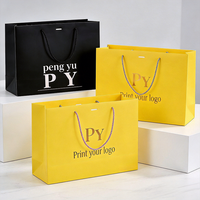 Individuelles Logo Einzelhandels-Markenfarbe Größenversion Verpackung Einkaufstasche mit Baumwollgriffen Luxuriöse Beschichtete Papiertüte für Kleidung Kosmetik