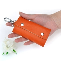 Precio de fábrica: Estuche de cuero para llaves de coche, funda organizadora con cadena, monedero, llavero, organizador de llaves de bolsillo