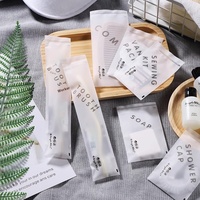 Fournitures d'hôtel Pantoufles de café Equipement Kit d'hygiène Savon Spa Set Pantoufles en Gris Articles de toilette jetables pour hommes Shampooing Bienvenue