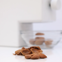 Casse-noix électrique réglable pour amandes, noisettes, pistaches et noix de pécan