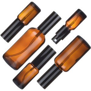 Flacon élégant en verre ambré cylindrique à épaule plate, opaque, avec compte-gouttes et impression sérigraphiée noire pour huiles essentielles de traitement - Product Image 4