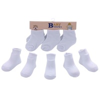 Prix de gros d'usine Chaussettes blanches pour nouveau-nés Chaussettes unies en coton blanc pour bébés Chaussettes de printemps