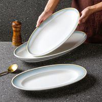 Vente en gros d'assiettes ovales modernes et écologiques en forme de poisson plats de dîner en plastique mélamine de 12 pouces plats de Noël en forme de poisson