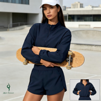 Veste de sport courte à col montant et fermeture éclair pour femme