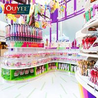 Comptoir de confiserie OUYEE personnalisé pour un montage facile, design de kiosque de centre commercial pour bonbons et sucettes, mobilier de présentation pour magasin de bonbons