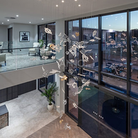 Lustre en verre ANNO avec design nuage organique, luminaire suspendu moderne pour salle à manger de villa de luxe