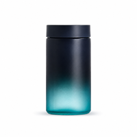 Pot en verre noir à dégradé de couleurs personnalisé, logo OEM, couvercle résistant aux enfants, bouchon en plastique écologique anti-odeur pour les bonbons au chocolat