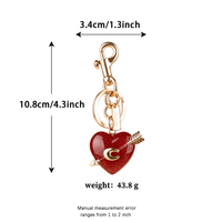 Breloque de sac en forme de cœur OEM&ODM, pendentif nœud perlé pour sac à main, pochette à cosmétiques, accessoire décoratif à suspendre au quotidien sur l'extérieur des sacs