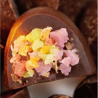 Suministro al por mayor de Pop Rocks crujientes rellenos de chocolate negro en envoltorio individual higiénico para regalo navideño