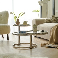 Table basse gigogne à 3 niveaux avec plateau en verre trempé transparent, structure rotative en acier inoxydable poli, design moderne et minimaliste pour le salon