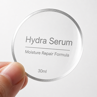 Étiquette personnalisée en rouleau pour flacon de sérum transparent avec feuille d'argent, autocollant cosmétique transparent et étanche pour emballage de soins de la peau