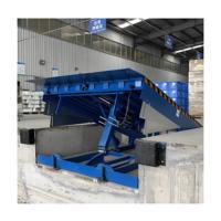 Rampe de déchargement hydraulique Offre Spéciale Hauteur réglable Rampe de conteneur de chariot élévateur de 10 tonnes Pont d'embarquement fixe