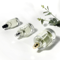 Bouteille de parfum de forme ronde sur mesure 30ml 50ml 100ml bouteille de pompe de lotion bouteille de parfum d'emballage de soins de la peau avec boîte