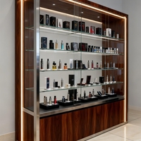 Vitrine de présentation de maquillage en verre trempé personnalisée avec éclairage LED couleur pour boutique de produits de fumée