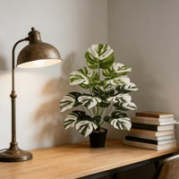 Plante artificielle Monstera avec de grandes feuilles artificielles de Monstera, verdure tropicale réaliste pour la décoration intérieure