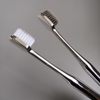 Vente en gros pas cher de haute qualité OEM logo personnalisé maison 144 or rose hôtel brosse à dents manuelle à poils souples Ultrasoft