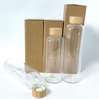 Bouteille d'eau et de jus en verre borosilicate portable avec bouchon hermétique en bambou pour l'école, la maison, le bureau, les voyages et le sport