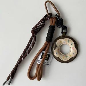 Vente en gros de porte-clés en cuir tressé en forme de beignet, style coréen, écologique, mignon, Miu, accessoires de sac, style dessin animé, pour voiture, pendentif, style Instagram - Product Image 4