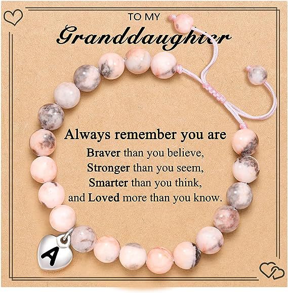 Pulsera rosa tejida con cebra y letra a