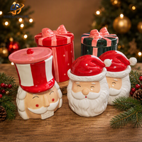 Pot à bougie en céramique brillant Père Noël avec couvercle en forme de chapeau rouge pour la décoration de Noël à la maison et les boutiques de cadeaux de fin d'année (vente en gros)