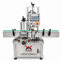 Machine automatique pneumatique de bouchage et de scellage pour bouteilles et canettes de shampoing liquide et de cosmétiques