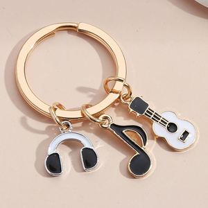 Nouveau produit phare : Pendentif de sac porte-clés en forme de disque musical, phonographe, clavier, écouteurs, microphone, piano, violon, batterie - Product Image 6