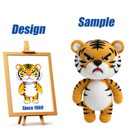 Shengye usine Kawaii bas quantité minimale de commande sur mesure au crochet jouets en peluche personnage assis en peluche Amigurumi Crochet Animal tigre poupée jouets