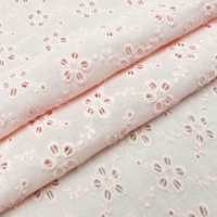 Tissu en coton brodé à œillets rose doux tissé pour robe