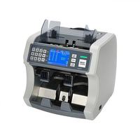 Machine de comptage et de vérification de billets de banque multidevises, prend en charge le comptage des dollars américains, des euros, des yuans chinois, etc., et affiche les résultats.
